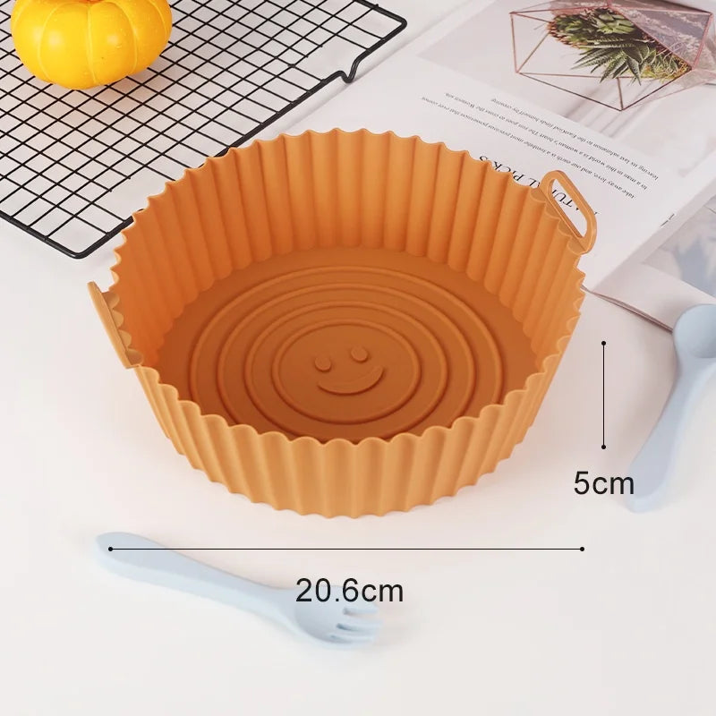 Round silicone air fryer liner in orange